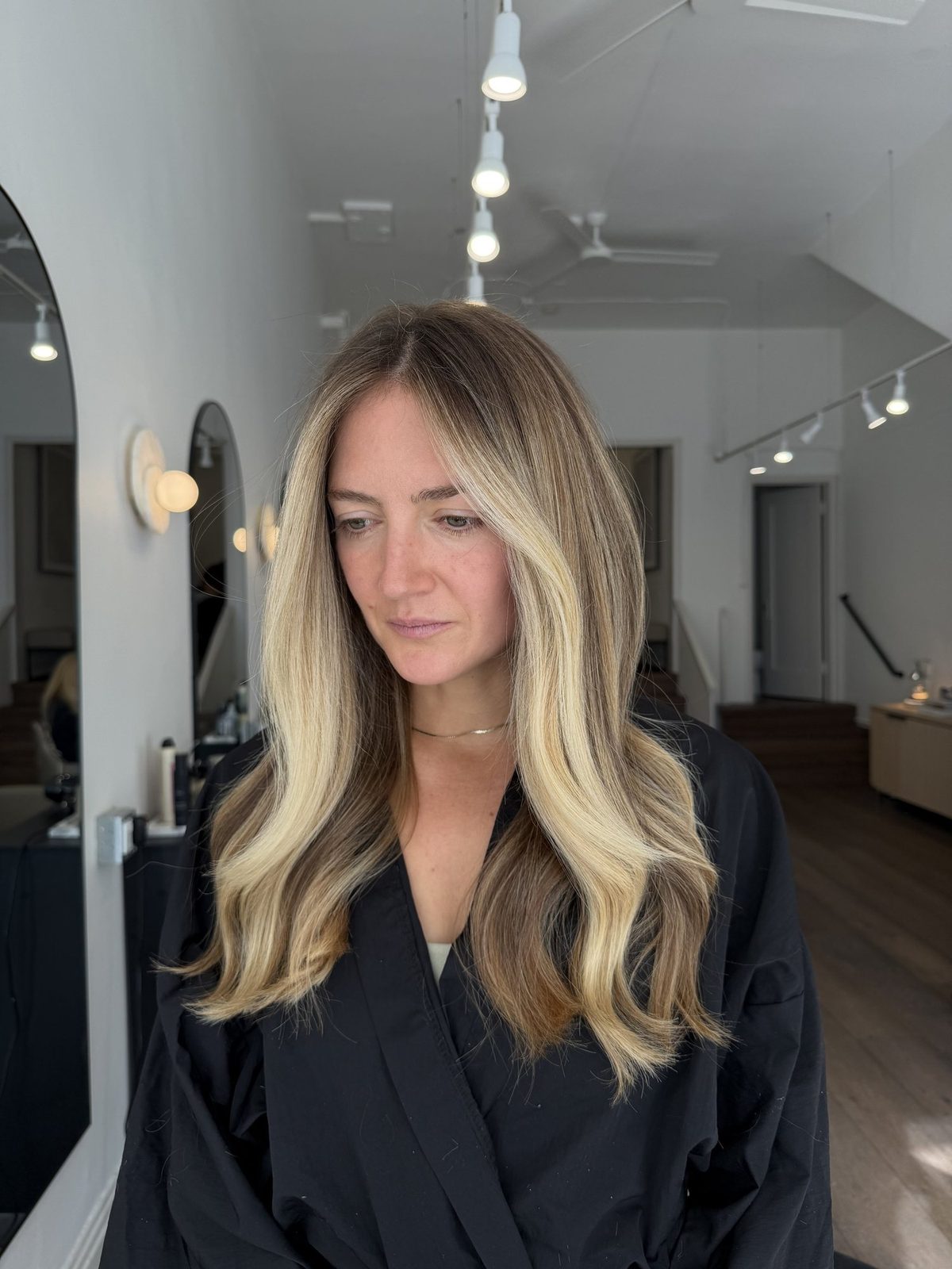 Dimensional, sunlit blonde color created at Era Salon