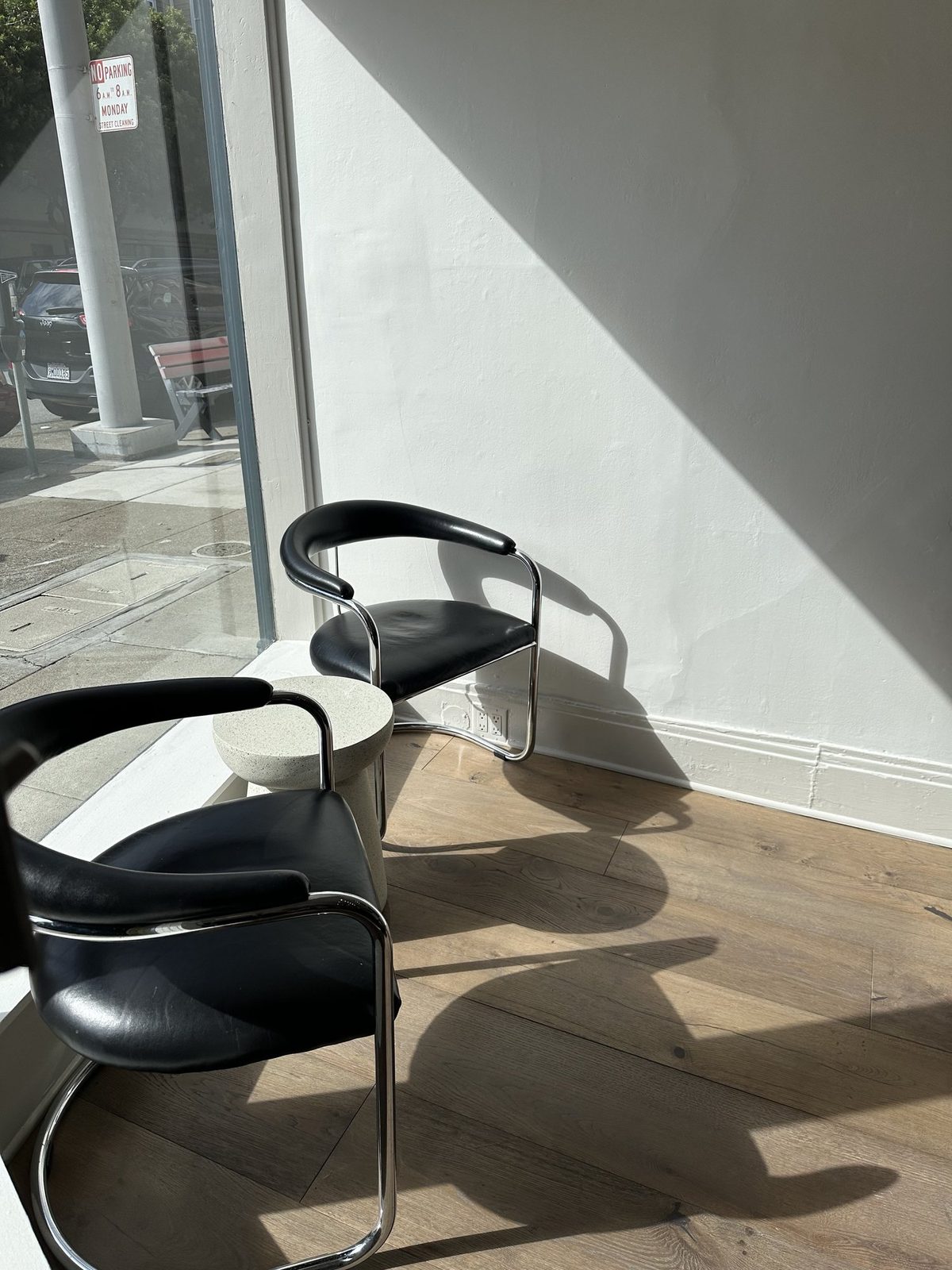 Soft daylight across a styling chair at Era Salon