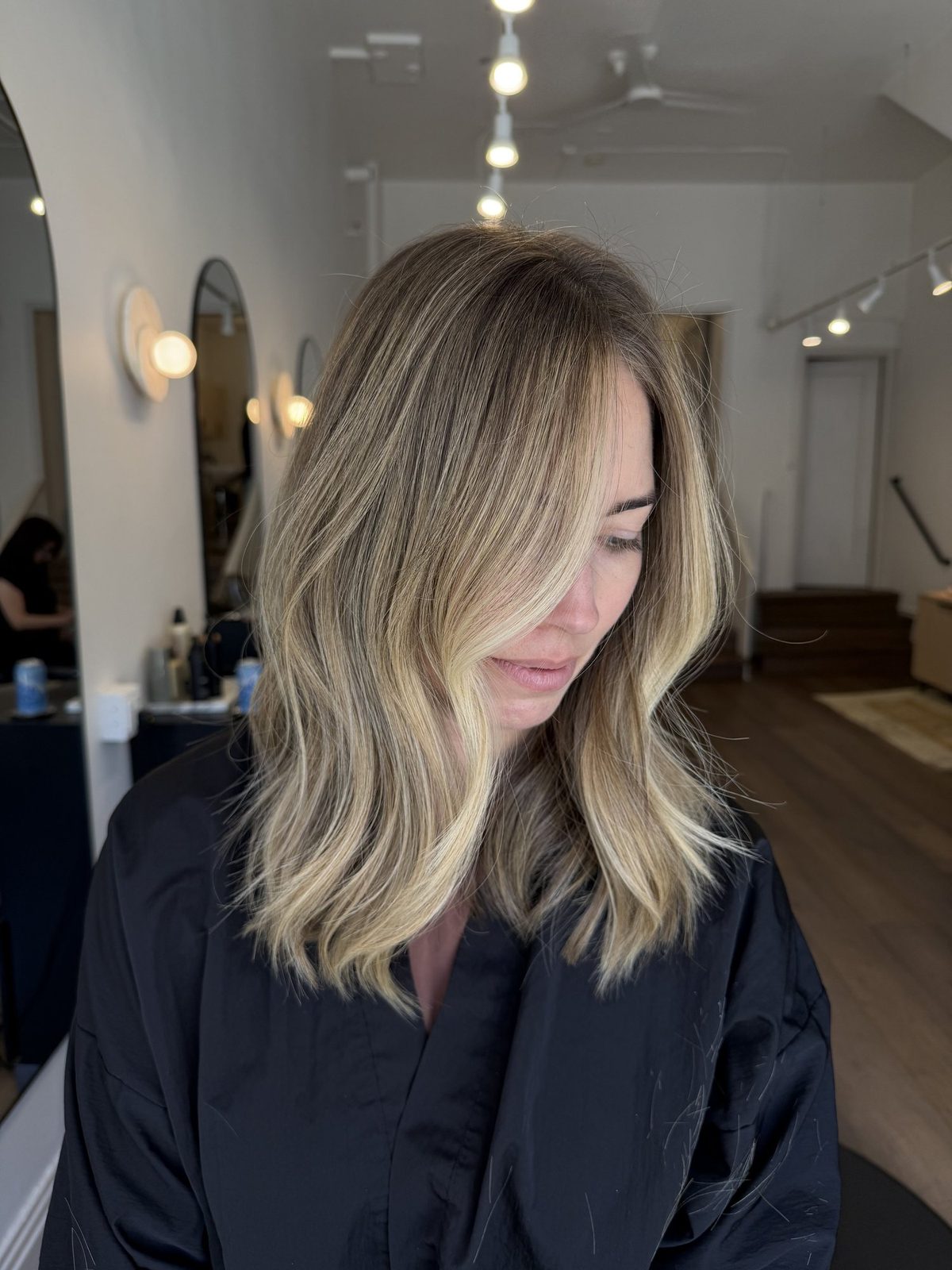 Soft, natural brunette waves styled at Era Salon